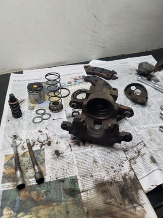 Passenger caliper disassembled.