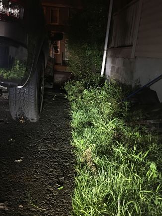 Hard to see but light went easily 75ft to the house across the street.