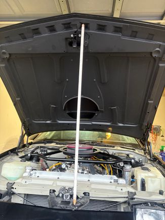 This fibreglass hood is still quite heavy.  Going to trim off the unecessary bits and install some venting which will improve temps under the hood, relieve engine bay pressure and weight.