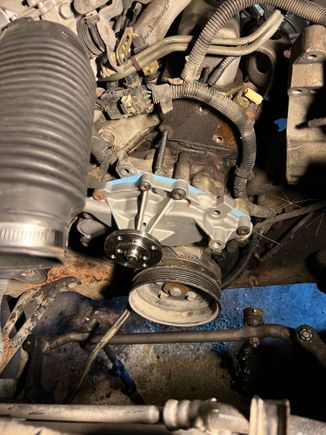 New Bosch water pump and Fel-Pro gasket. Glad I got the gasket, Bosch FOLDED the one in the box, breaking it in half.

Also, the boss for the Power steering pump is tapped for the wrong hole size. It’s the same size as the larger bolts on the PS pump bracket for some reason.