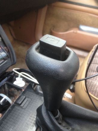 Pulled the shiny button cover up and off