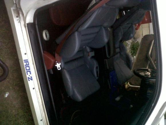the red rear seats will be swapped soon and seat belts have been swapped since this photo