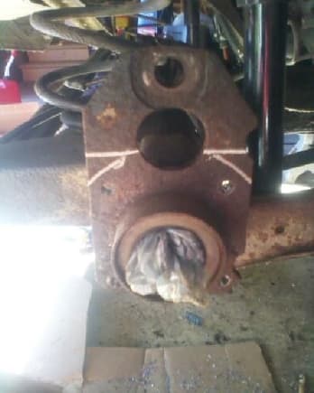 stripped the old drum brakes off,cut part of the brake bracket off using a saws all.