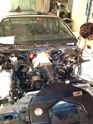 putting the new engine in.
