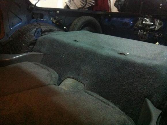 Removal of non carpeted rear plastics.