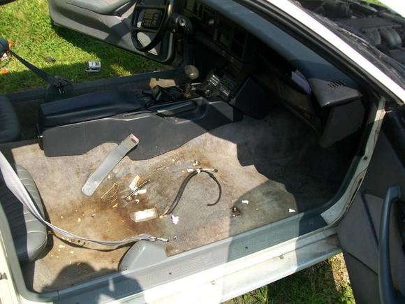 next goes the carpet and center console