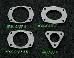 RJC Racing GN Flanges. Stock size is top right. They also make this style flange in a 3" opening size.