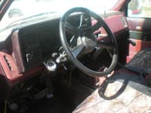 the dash suprisingly for as old as the truck is its in decent shape minus the carpet which needs replaced
mosey oaks floor mats and team real tree seat cover