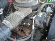 its mising the smog pump but who needs it anyway that thing makes ya loose power it was already off when i baught it also my egr valve needs replaced or cleaned its got old and wet oil around it