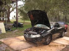 Donor car: Totaled 99 Camaro Z28. Ready to drop the engine, trans and crossmember out from underneath in one piece.