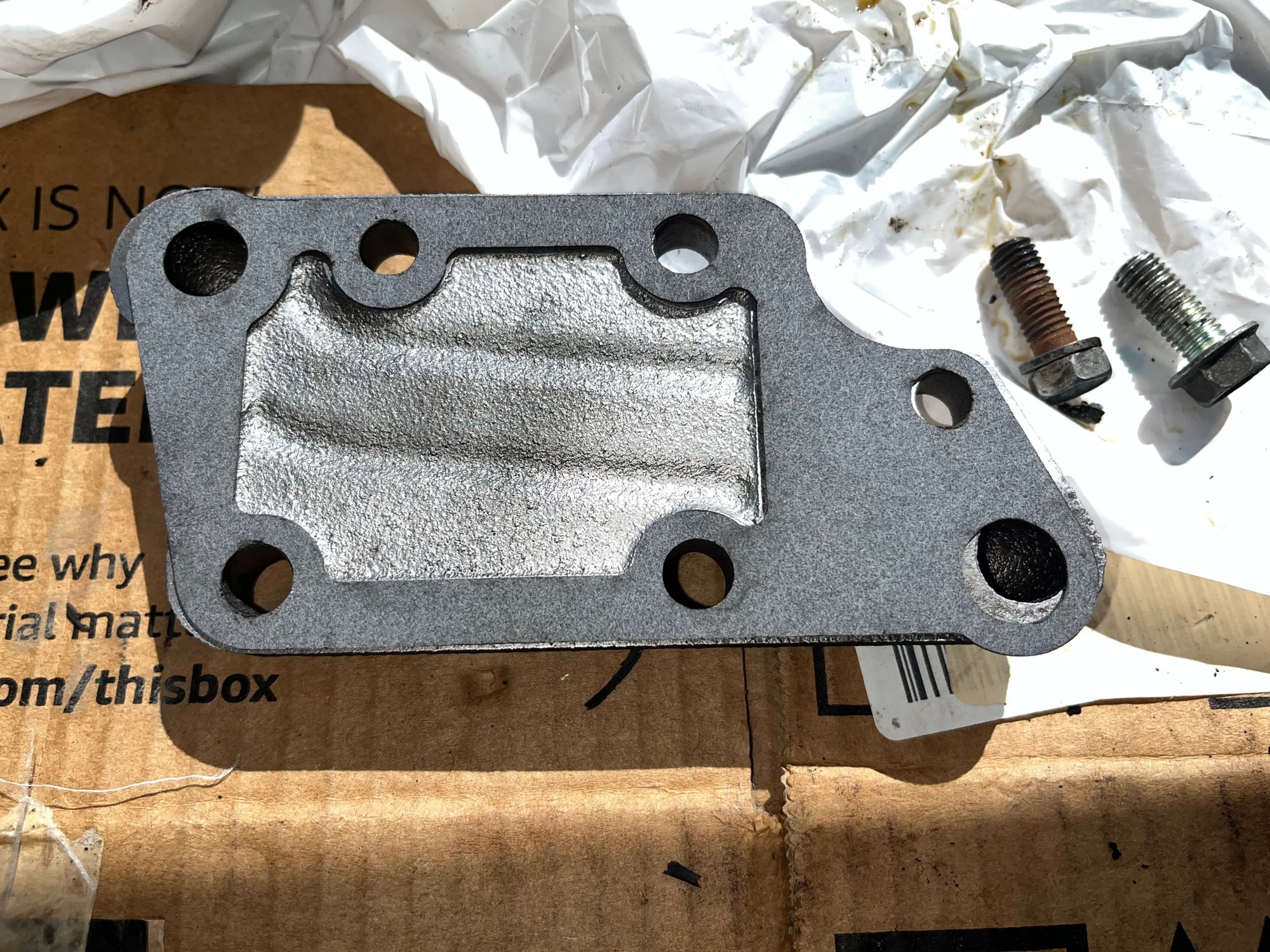 Cover plate with bolt boles aligned but lower water passage is not