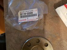 Part # for the spacer and the flywheel bolts part # 90105-10294 
 Both came from a Toyota parts website.
 1993 2jz Supra with 4 speed automatic