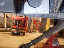 Frame tube jig. Centered between the body mount. Used the body mount to get them close then squared them off the front leaf spring hanger to confirm. Debated using a hole saw but went with a torch for 3 of the 4 holes. Torched the outside frame rail first on passenger and drive side. The inside rail would prevent the torch from catching something on fire while i was on the other side of the frame.