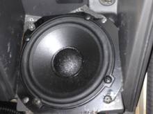 Boston 4" speaker jammed into the stock 4Runner dash 4T speaker holes. The screws are stock. I think I nipped off the upper left ear so it would fit. The foam squeezing out is a 4" foam speaker enclosure.
