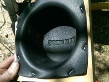 BOOMMAT speaker baffle stapled to 3/4" MDF ring cut larger than the speaker diameter to give a little room.