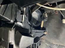 What does the flat rod next to the squirrel cage (upper left hand side) do and should something be attached to it?