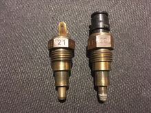 The one on the right hand side has corrosion on the sensing tip.