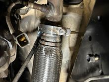 Driver side. You can see where I cut the manifold here to be able to clock it away from the frame. Trimming of the heat shield by the O2 sensor required.