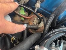 Here’s a pic of the top of my canister, have the vapor line connected to the line closest to firewall, the vacuum in the middle, and the Outer Vent Control Valve that has the hose in question now attached to it. Both the vapor line and the OVCV were removed previously.