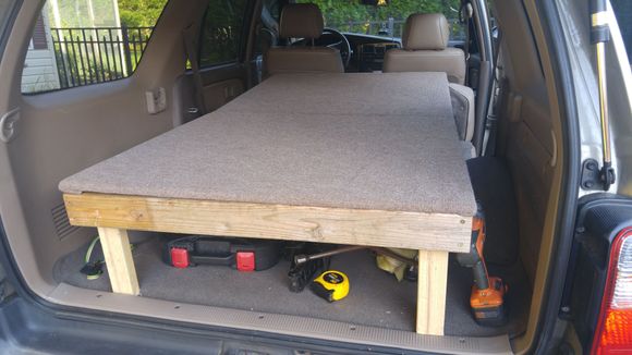 With the seats down, the bed platform extends about 6ft (I took this picture before I put the sides and bottom on the "toolbox")