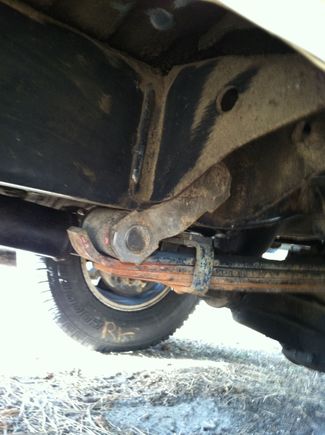 Front spring shackles resting on the frame.  Not good... I have some front leaf packs from another toyota so hopefully i can put some "b*stard" packs together out of all the leafs i have around now to get the shackles off the frame. Drilled out old bushing from the used leafs and got new harris bushings ready to go in upon install. I'd like to get shackles, ubolts, etc but i think that will happen once i redo the suspension properly. For now we need at least some frame clearance.