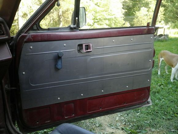 Kind of copied the factory door panel's overall look, made a few changes but kept the basic design