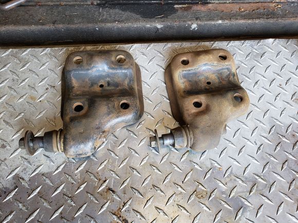 After a little grinding on the axle perches. Turns out the original coating had held up pretty well.