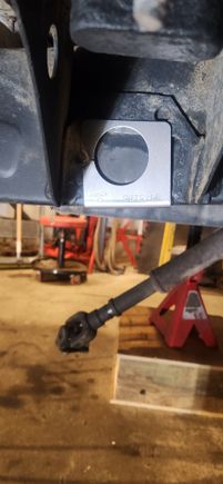 Frame tube jig. Centered between the body mount. Used the body mount to get them close then squared them off the front leaf spring hanger to confirm. Debated using a hole saw but went with a torch for 3 of the 4 holes. Torched the outside frame rail first on passenger and drive side. The inside rail would prevent the torch from catching something on fire while i was on the other side of the frame.