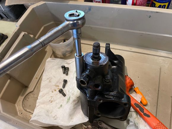 Remove 4 bolts on the valve body and turn the inpt shaft to separate. Prepare for about 44 ball bearings to come falling out.