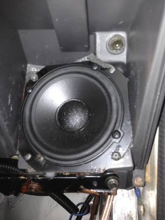 Boston 4" speaker jammed into the stock 4Runner dash 4T speaker holes. The screws are stock. I think I nipped off the upper left ear so it would fit. The foam squeezing out is a 4" foam speaker enclosure.