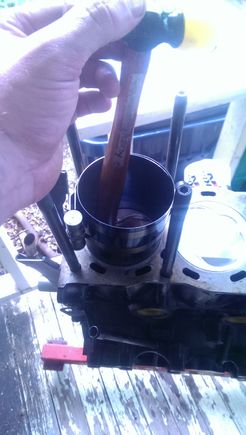 The process I used with the compressor and a hammer handle to (Very gently - not a lot of pressure) push the pistons down in the cylinder
