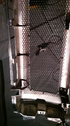 Got the mesh piece from www.customcargrills.com