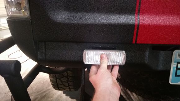 I think what would look the best would be to cutout the rear valence and have them flush mounted.  There's plenty of room back there to do it.