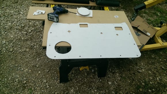 cardboard template for passenger side lower door panel (mirror of right side minus rear door handle)