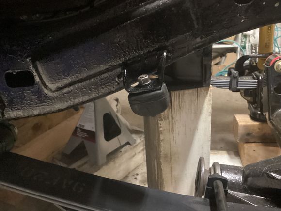 Small spring bump stops or pads. Not sure what they’re called. 