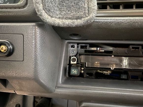 button installed, one screw keeps it in place