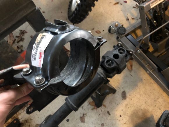 some spare metric bolts from the coffee can and bam, no dust shield.  
