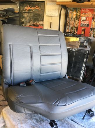 This is where you snake seat belt buckle through,,dont even attempt with the buckle still mounted in truck