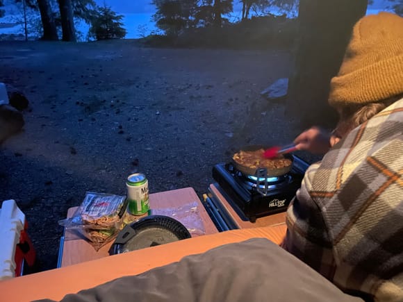 We realized on our most recent trip that you can make a really wide cooking platform by putting one hatch cover on each drawer. And, if you're lazy like us, you can cook from the comfort of your own bed and completely out of the rain! We will definitely be doing this again for simple meals.