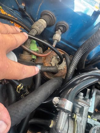 Here’s a pic of the top of my canister, have the vapor line connected to the line closest to firewall, the vacuum in the middle, and the Outer Vent Control Valve that has the hose in question now attached to it. Both the vapor line and the OVCV were removed previously.