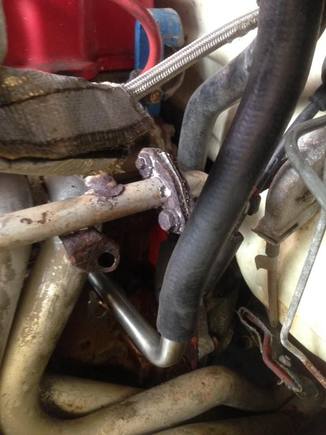 New formed hose has a bend in it. No longer needs the funky insert metal thing