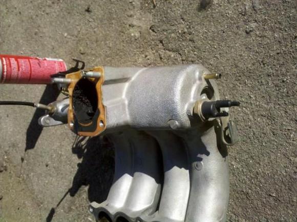 Went to clean out the throttle body. Found all the gunk in the manifold, so i decided to take it out and get hot tank. Gained some power.