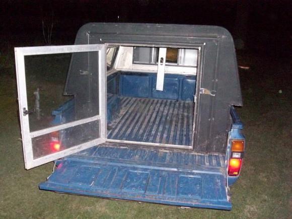 the door opens two ways out like this and the whole back will lift up!!!!!!!