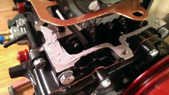 Close up shot of the Ultra Grey silicone around the front timing cover area.  (yeah, I copper coated my head gasket...I know some don't, but I do.)