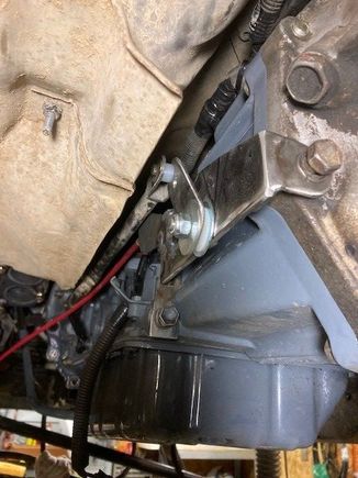 with the nylon washers and spacer that I used I had better put some heat shielding here before I put the exhaust together.