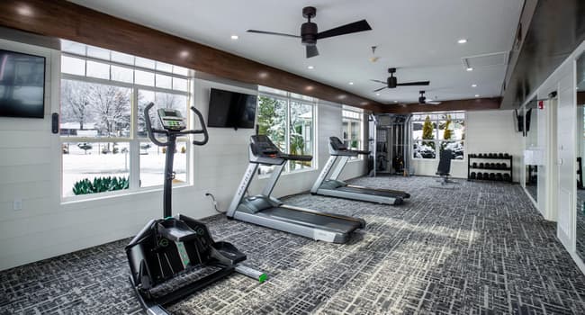 Unwind at our modern fitness hub, a serene space featuring state-of-the-art equipment, providing residents with a rejuvenating workout environment.